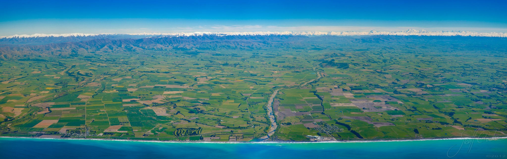Aerial panorama of our coastline looking straight up the Pareora River Photography By Geoff Cloake 2012 copyright