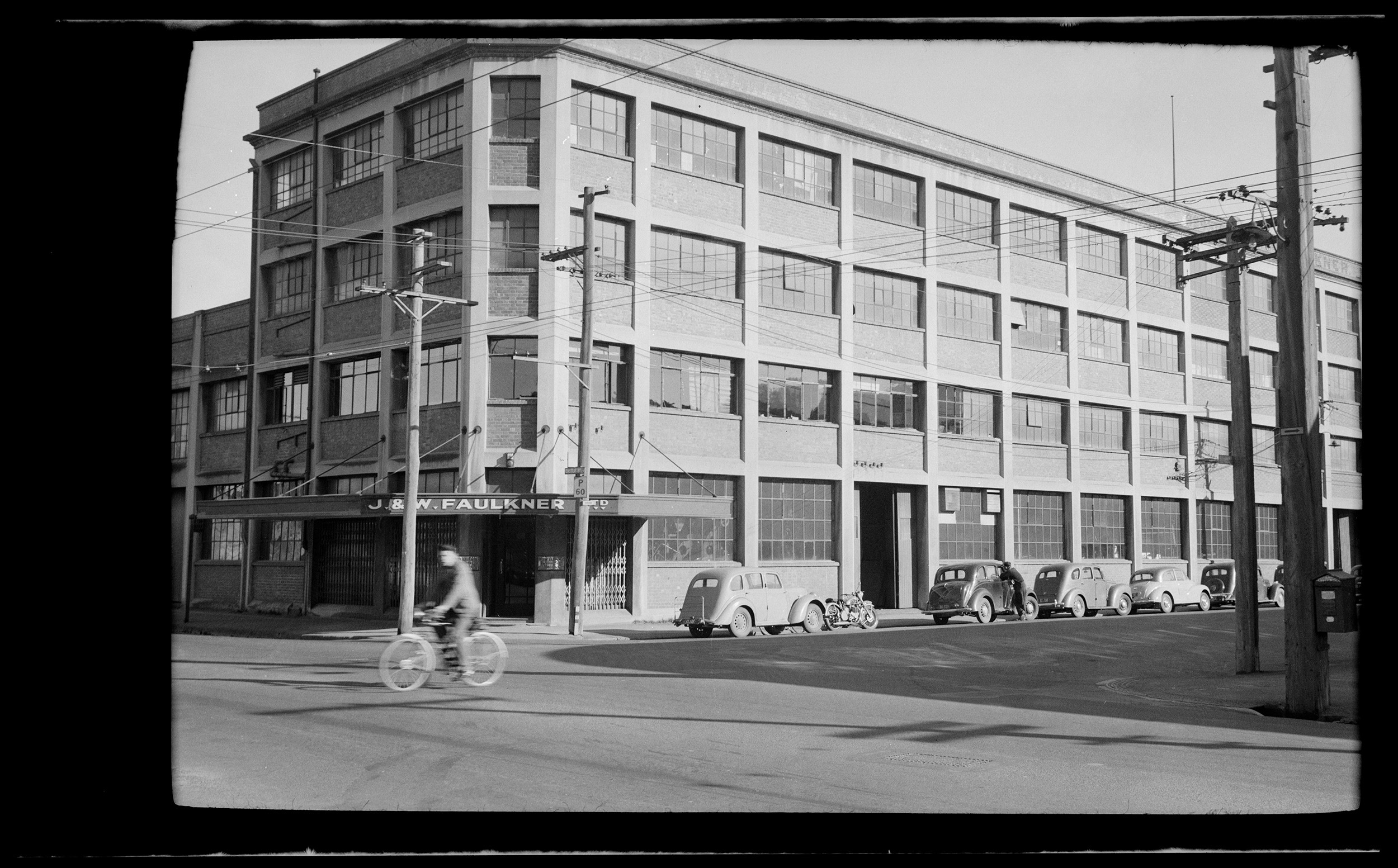 The J.&W. Faulkner building at corner of Castle and St Andrew Sts, Dunedin, photographer unknown, c.1960. J.&W. Faulkner Limited: records. MS-4914/293