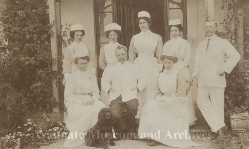 Waimate Hospital Nursing Staff including Dr Barclay Includes Matron Mander Nurse Gorman Warder Penrose Nurse Watt tall nurse standing centre of back row Nurse Neal Nurse Detford p1374